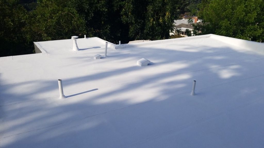 Home roof in California with the elastomeric coating (acrylic) coating